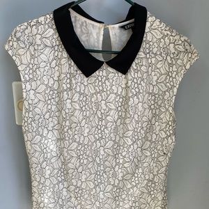 Lightly worn Collared Express top in medium